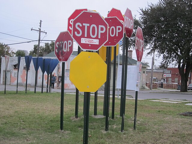 An image of many stop signs all clustered together.